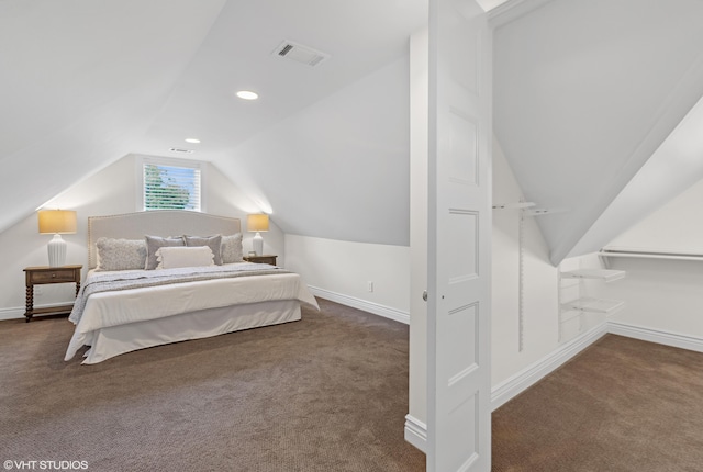 1310 Harrison Ave, Saint Joseph, MI 49085 - bedroom featuring carpet floors, vaulted ceiling, and baseboards