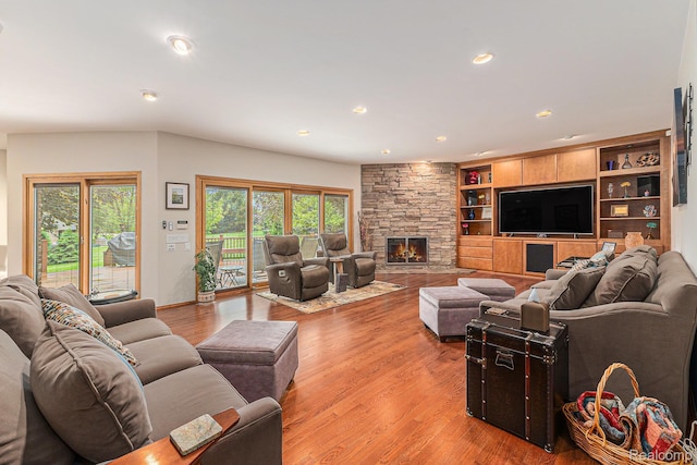 3870 Glen Falls Dr, Bloomfield Hills, MI 48302 - living room featuring plenty of natural light, a fireplace, light wood-style flooring, and recessed lighting