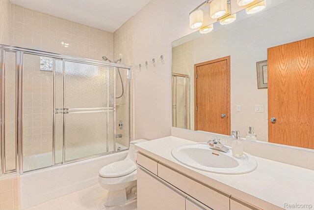 3870 Glen Falls Dr, Bloomfield Hills, MI 48302 - full bathroom featuring toilet, vanity, shower / bath combination with glass door, and tile patterned flooring