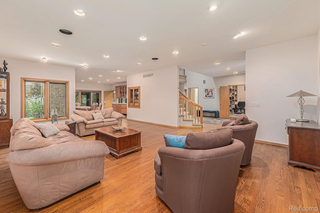 3870 Glen Falls Dr, Bloomfield Hills, MI 48302 - living room featuring stairway, light wood-type flooring, and recessed lighting