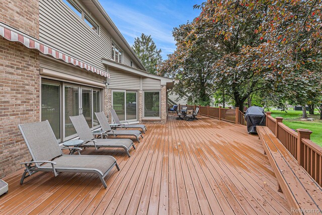 3870 Glen Falls Dr, Bloomfield Hills, MI 48302 - wooden deck featuring outdoor dining space and a grill