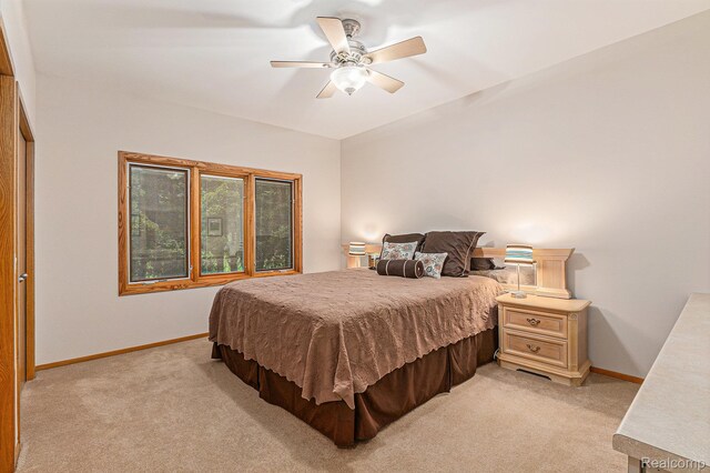 3870 Glen Falls Dr, Bloomfield Hills, MI 48302 - bedroom featuring light colored carpet, baseboards, and a ceiling fan