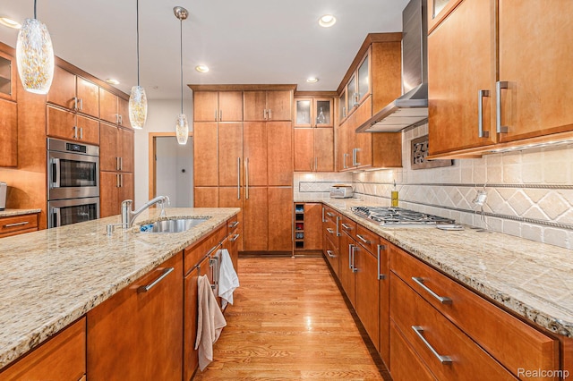 3870 Glen Falls Dr, Bloomfield Hills, MI 48302 - kitchen featuring a sink, stainless steel appliances, wall chimney exhaust hood, brown cabinetry, and recessed lighting