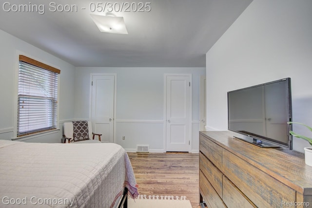 1012 W 12 Mile Rd, Royal Oak, MI 48073 - bedroom with light wood finished floors and baseboards