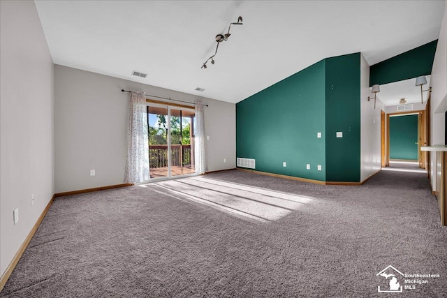 15795 Lakeside Dr, Southgate, MI 48195 - empty room with carpet, baseboards, and track lighting