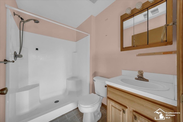15795 Lakeside Dr, Southgate, MI 48195 - full bath with a shower, toilet, vanity, baseboards, and tile patterned flooring