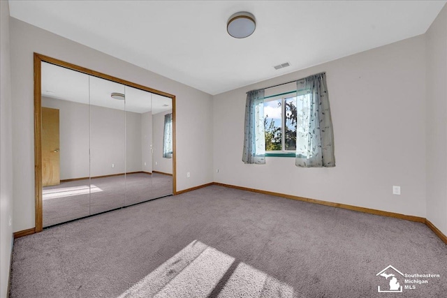 15795 Lakeside Dr, Southgate, MI 48195 - unfurnished bedroom with carpet floors, baseboards, and a closet