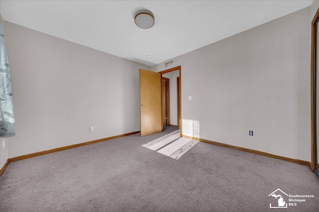 15795 Lakeside Dr, Southgate, MI 48195 - unfurnished room featuring carpet and baseboards