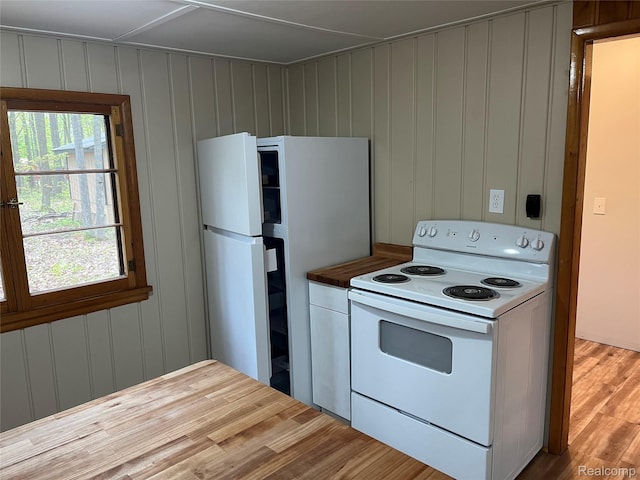 478 Karcher Rd, Rose City, MI 48654 - kitchen with white appliances, wood finished floors, and wooden counters