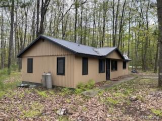478 Karcher Rd, Rose City, MI 48654 - view of side of property with a wooded view