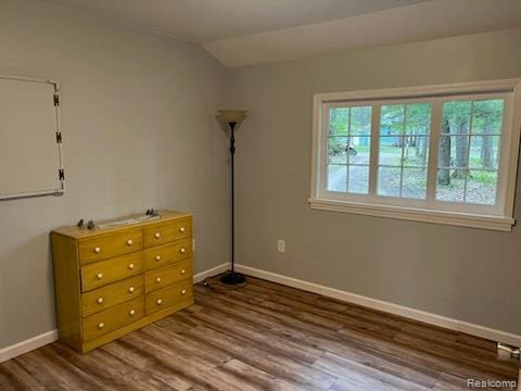 478 Karcher Rd, Rose City, MI 48654 - bedroom with baseboards, wood finished floors, and lofted ceiling