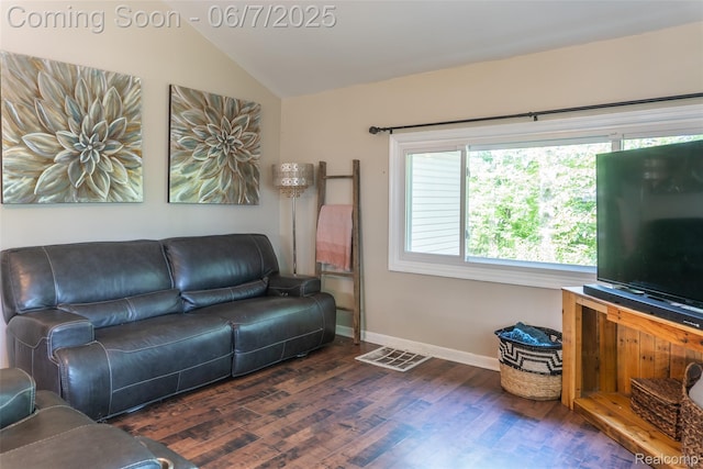 421 S Opdyke Rd, Auburn Hills, MI 48326 - living area featuring wood finished floors, lofted ceiling, and baseboards