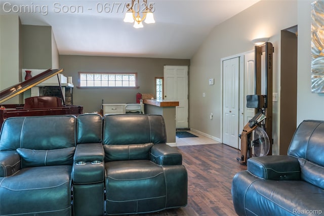 421 S Opdyke Rd, Auburn Hills, MI 48326 - living room with lofted ceiling, wood finished floors, and baseboards