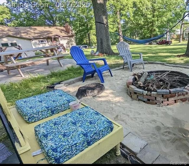 421 S Opdyke Rd, Auburn Hills, MI 48326 - view of patio / terrace with an outdoor fire pit