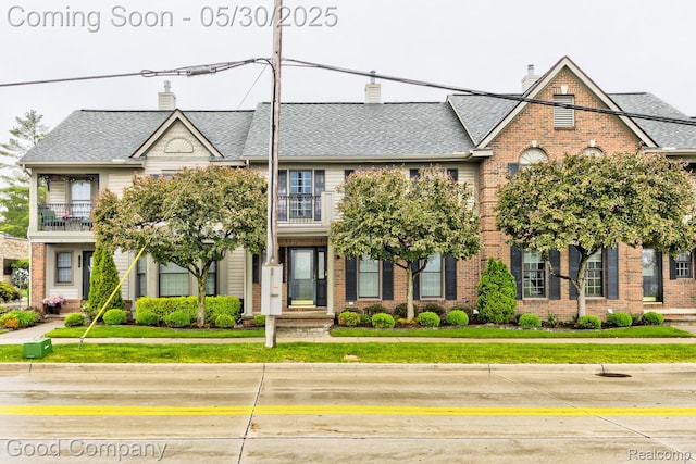 1660 Normandy Rd, Clawson, MI 48017 - view of property featuring brick siding and a chimney