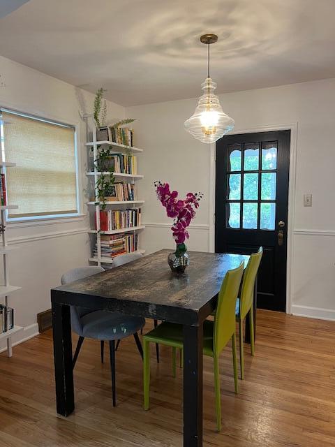 808 Princeton Ave, Ann Arbor, MI 48103 - dining space with plenty of natural light and light wood-style floors