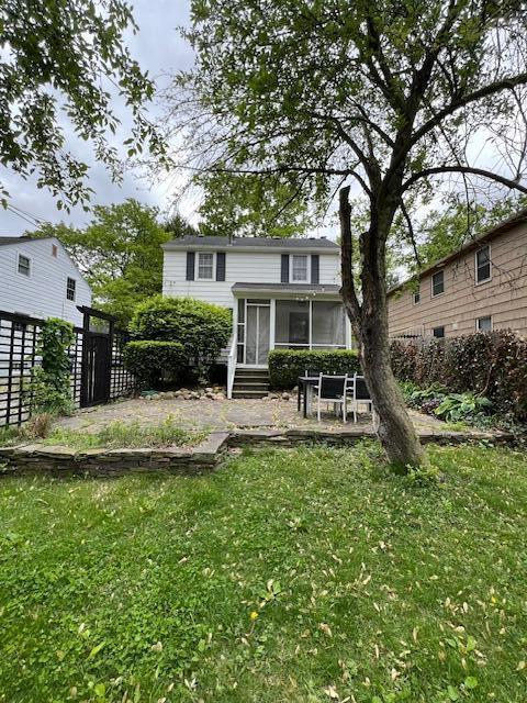 808 Princeton Ave, Ann Arbor, MI 48103 - back of property featuring a sunroom
