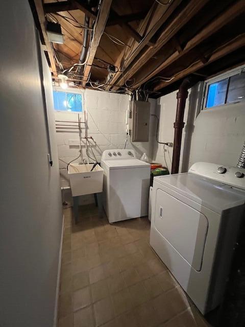 808 Princeton Ave, Ann Arbor, MI 48103 - laundry room featuring independent washer and dryer, electric panel, and light floors