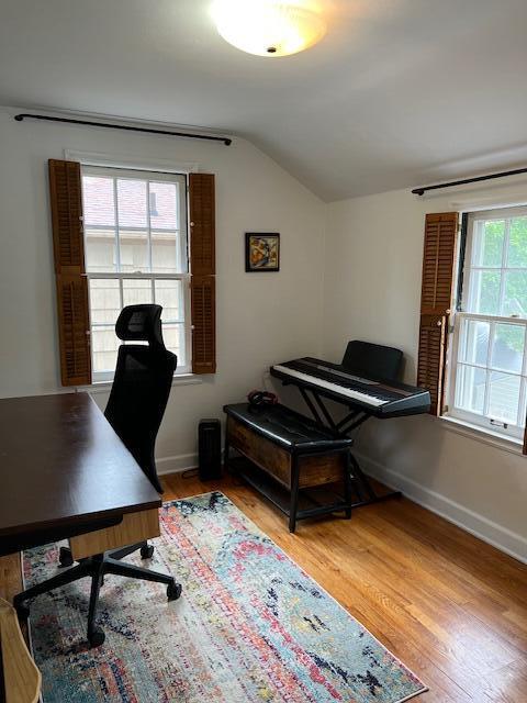 808 Princeton Ave, Ann Arbor, MI 48103 - office space featuring baseboards, wood finished floors, and lofted ceiling