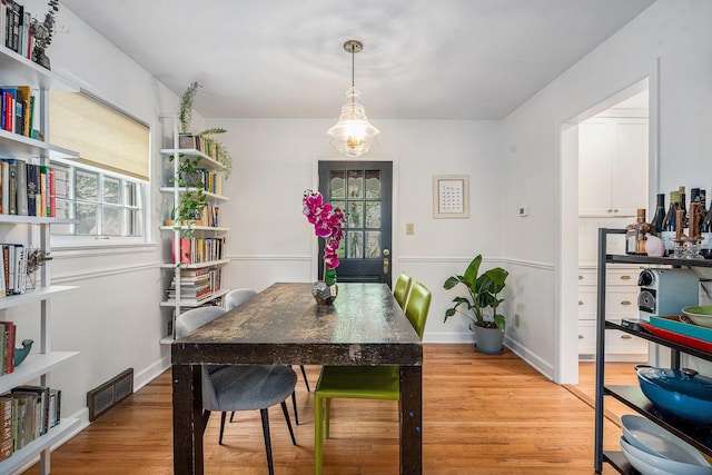 808 Princeton Ave, Ann Arbor, MI 48103 - dining area with light wood finished floors