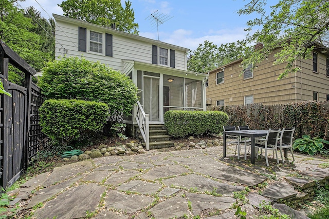 808 Princeton Ave, Ann Arbor, MI 48103 - rear view of property with a patio area and a sunroom