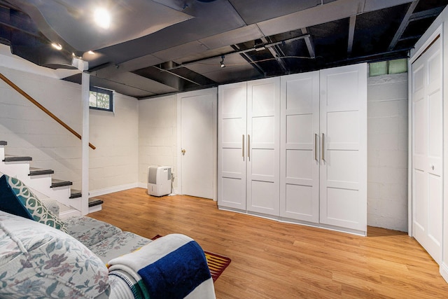 808 Princeton Ave, Ann Arbor, MI 48103 - basement featuring light wood-style floors and stairway