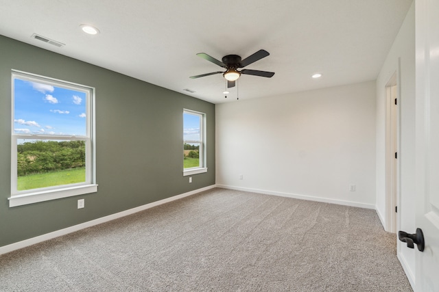 705 Montels Way, Charlotte, MI 48813 - spare room featuring carpet flooring, a ceiling fan, recessed lighting, and baseboards
