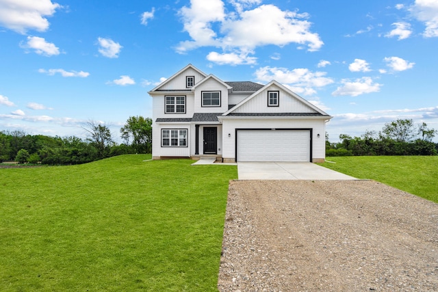 705 Montels Way, Charlotte, MI 48813 - view of front of house featuring dirt driveway, a front yard, and an attached garage