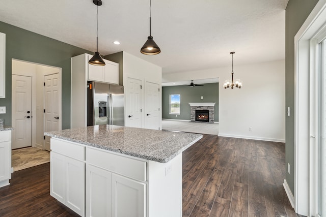 705 Montels Way, Charlotte, MI 48813 - kitchen with stainless steel refrigerator with ice dispenser, dark wood-type flooring, ceiling fan, white cabinets, and recessed lighting