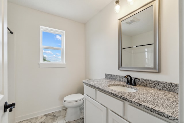 705 Montels Way, Charlotte, MI 48813 - full bathroom featuring vanity, baseboards, toilet, and a shower