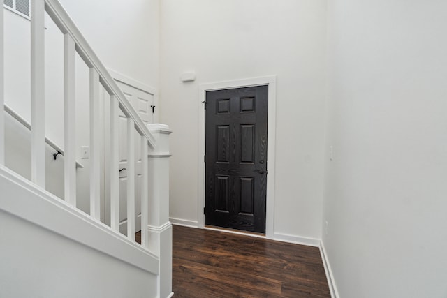 705 Montels Way, Charlotte, MI 48813 - entryway with wood finished floors, baseboards, and stairs