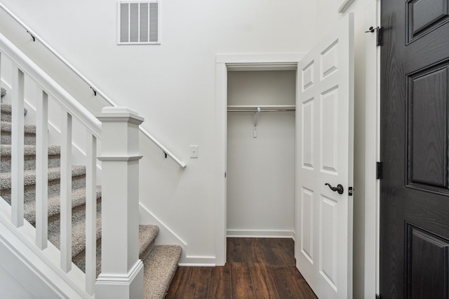 705 Montels Way, Charlotte, MI 48813 - stairway with wood finished floors and baseboards