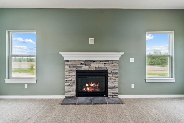 705 Montels Way, Charlotte, MI 48813 - detailed view of carpet floors, a fireplace, and baseboards