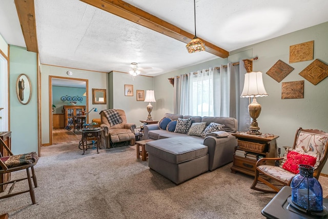 75 Taylor Ave, Battle Creek, MI 49037 - living room with carpet, beamed ceiling, a ceiling fan, and a textured ceiling