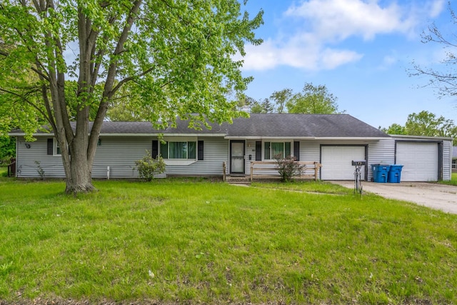 75 Taylor Ave, Battle Creek, MI 49037 - ranch-style house featuring an attached garage, a front lawn, and driveway