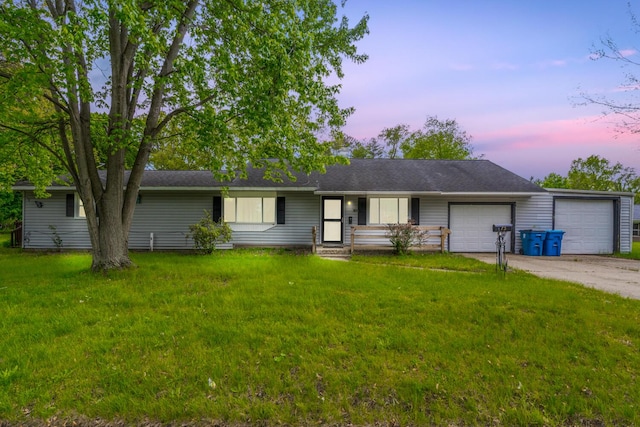 75 Taylor Ave, Battle Creek, MI 49037 - single story home with a garage, a yard, and driveway