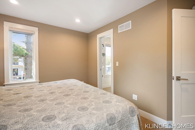 127 Emmet St, Grand Haven, MI 49417 - carpeted bedroom featuring recessed lighting and baseboards