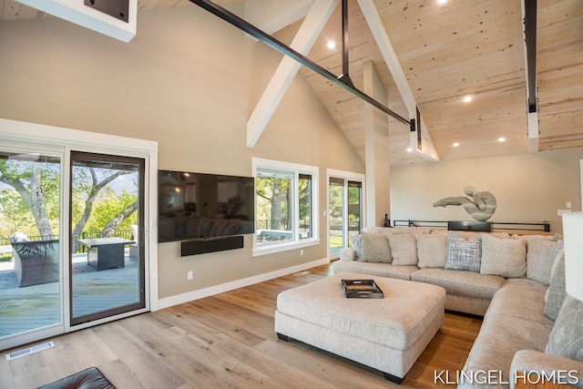 127 Emmet St, Grand Haven, MI 49417 - living area featuring high vaulted ceiling, wood finished floors, recessed lighting, wooden ceiling with exposed beams, and baseboards