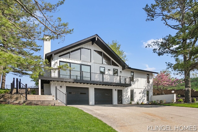 127 Emmet St, Grand Haven, MI 49417 - view of front of property with a chimney, an attached garage, brick siding, a balcony, and concrete driveway