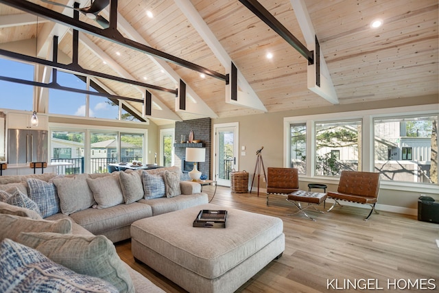 127 Emmet St, Grand Haven, MI 49417 - living area with wooden ceiling with exposed beams, wood finished floors, baseboards, high vaulted ceiling, and recessed lighting