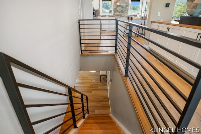 127 Emmet St, Grand Haven, MI 49417 - staircase with wood finished floors