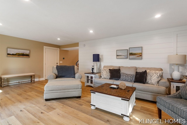 127 Emmet St, Grand Haven, MI 49417 - living area featuring light wood finished floors, recessed lighting, stairs, and baseboards