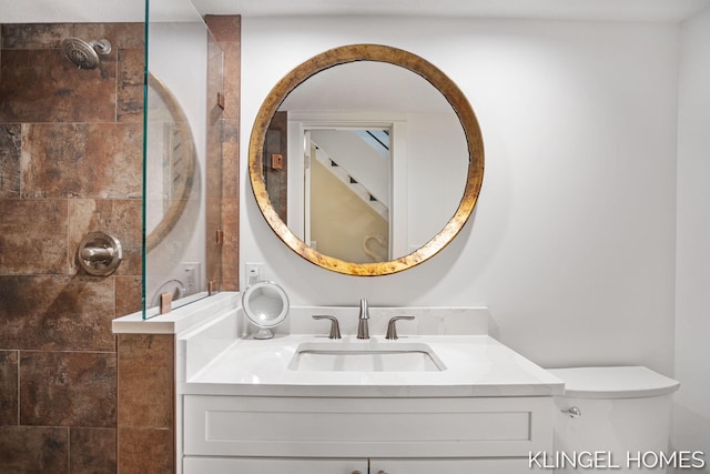 127 Emmet St, Grand Haven, MI 49417 - full bathroom featuring walk in shower, vanity, and toilet