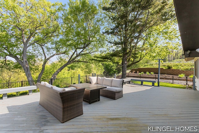 127 Emmet St, Grand Haven, MI 49417 - wooden deck featuring an outdoor hangout area