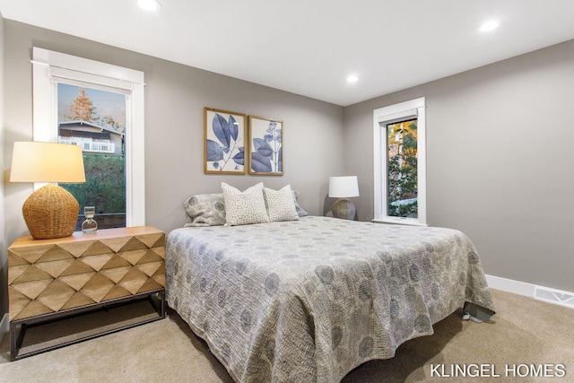 127 Emmet St, Grand Haven, MI 49417 - carpeted bedroom featuring recessed lighting