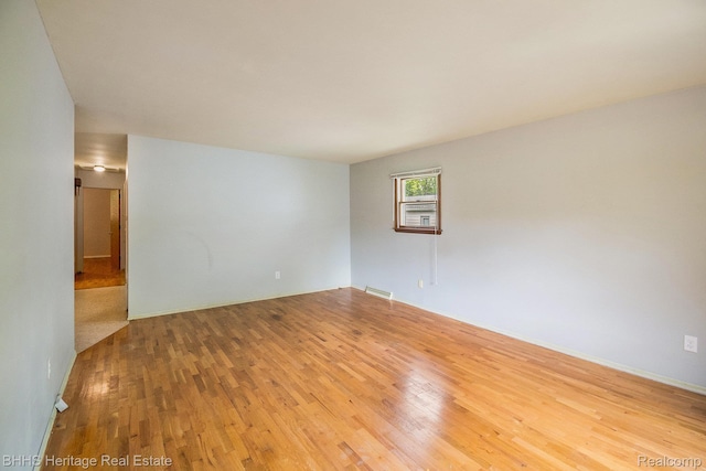 3226 Glasgow Dr, Lansing, MI 48911 - empty room featuring wood finished floors
