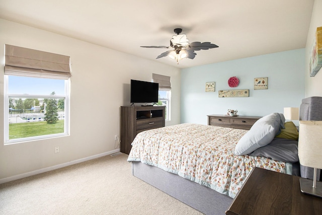 8825 Aveling Way, Richland, MI 49083 - bedroom with light carpet, baseboards, and a ceiling fan
