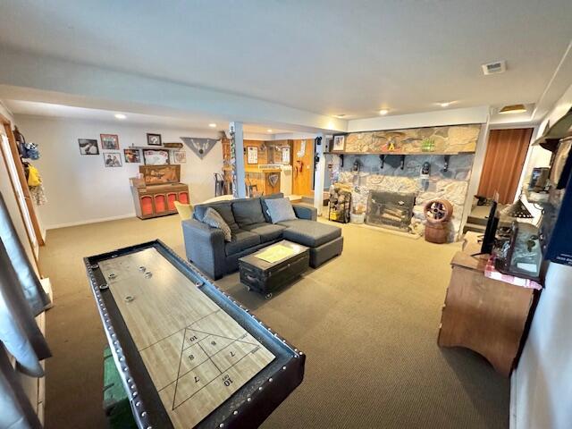 1022 Ottland Shrs, Lake Odessa, MI 48849 - living room featuring carpet