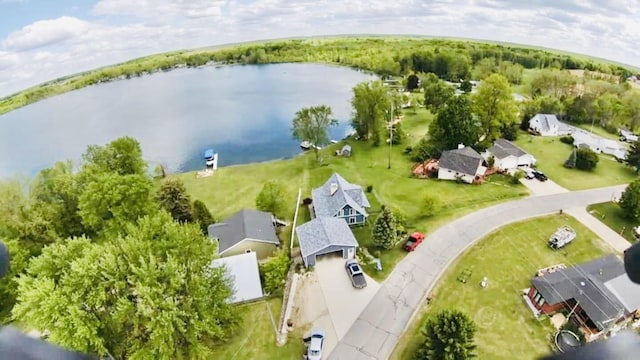 1022 Ottland Shrs, Lake Odessa, MI 48849 - aerial view of residential area with a large body of water