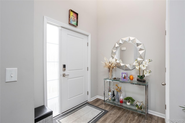 132 Copper Ridge Ct, Walled Lake, MI 48390 - foyer with wood finished floors and baseboards